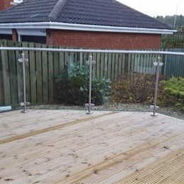 Decking with steel handrails & glass panels