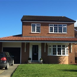 Wrap around extension with garage & full front canopy.